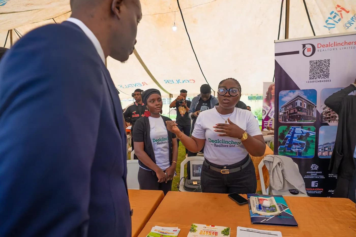 A recruiter pitching to delegates at an employer stand