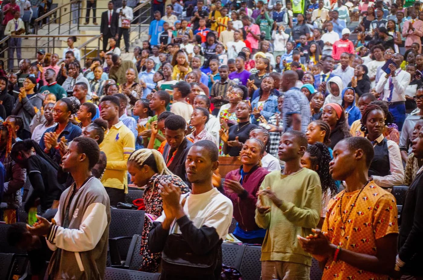 The auditorium packed with young delegates during an AYAC session